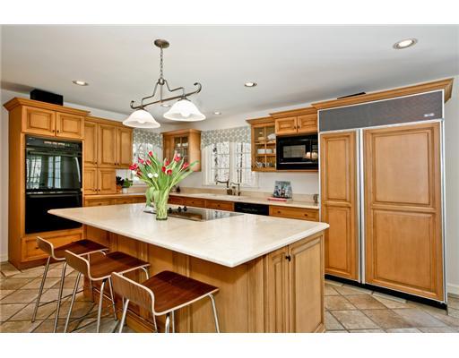 122 Colony Road Darien, CT 06820 - Photo 6 of 19 a kitchen with stainless steel appliances granite countertop a refrigerator a sink dishwasher and a stove with wooden floor