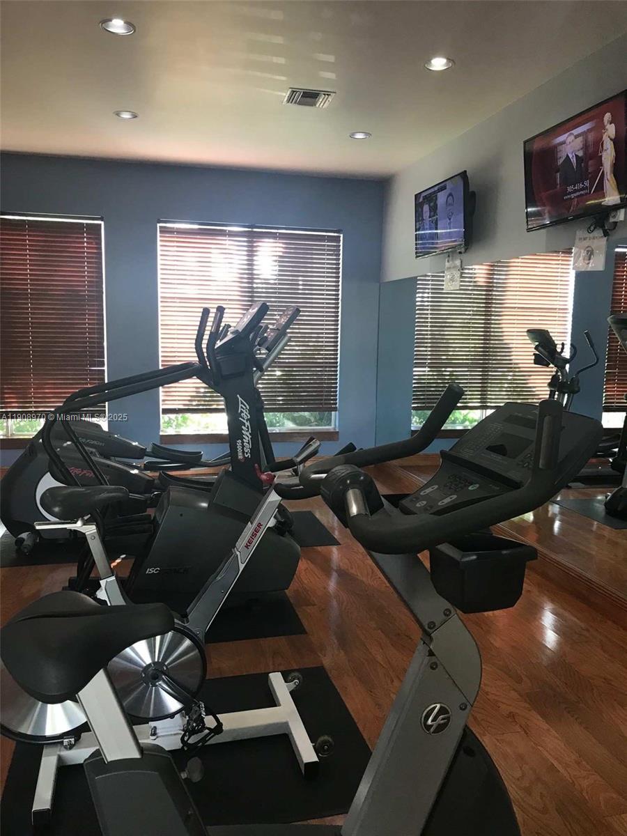 2173 Renaissance Boulevard, Unit 105 Miramar, FL 33025 - Photo 11 of 16 a room with gym equipment