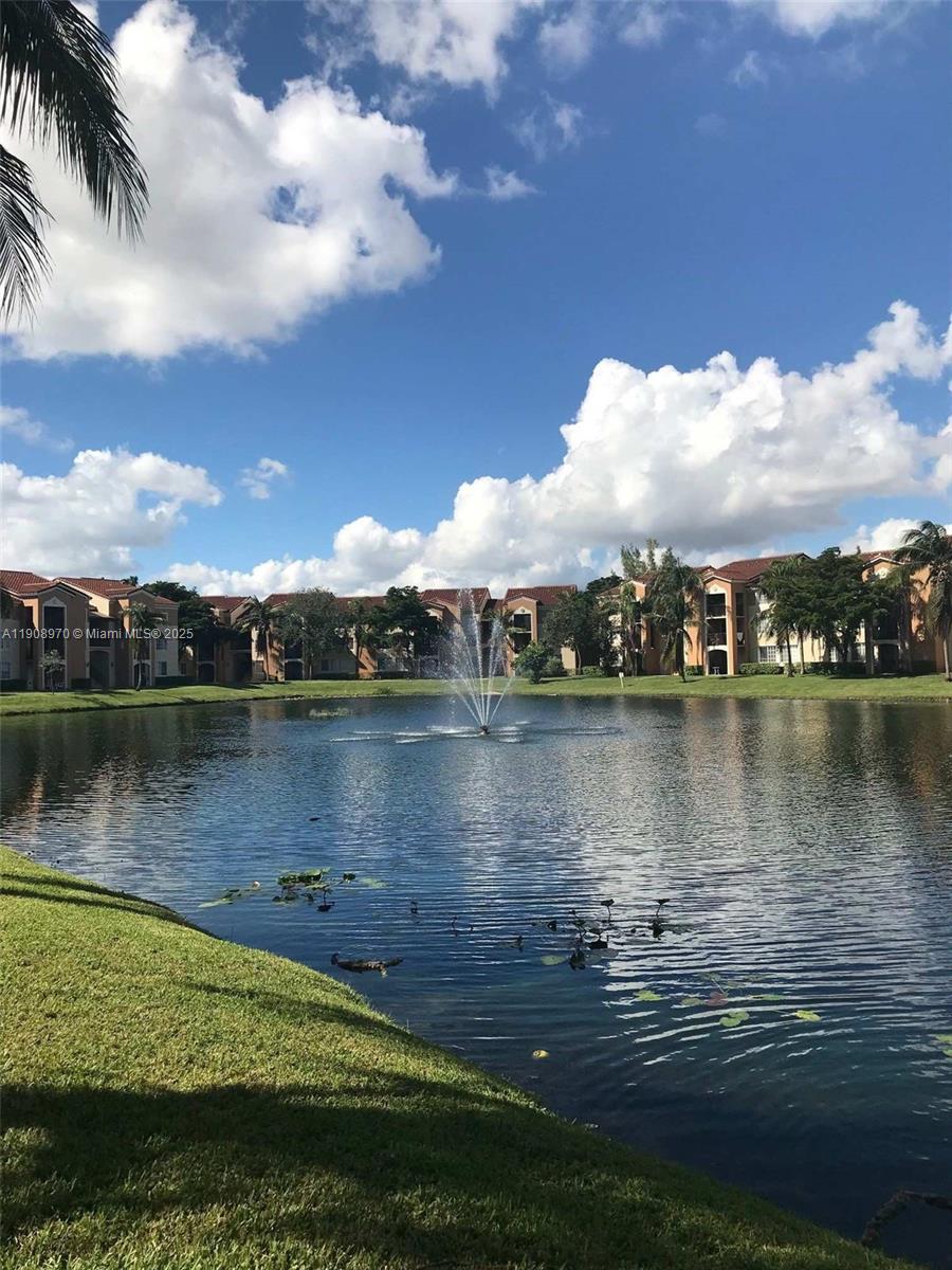 2173 Renaissance Boulevard, Unit 105 Miramar, FL 33025 - Photo 16 of 16 a view of a lake with a city