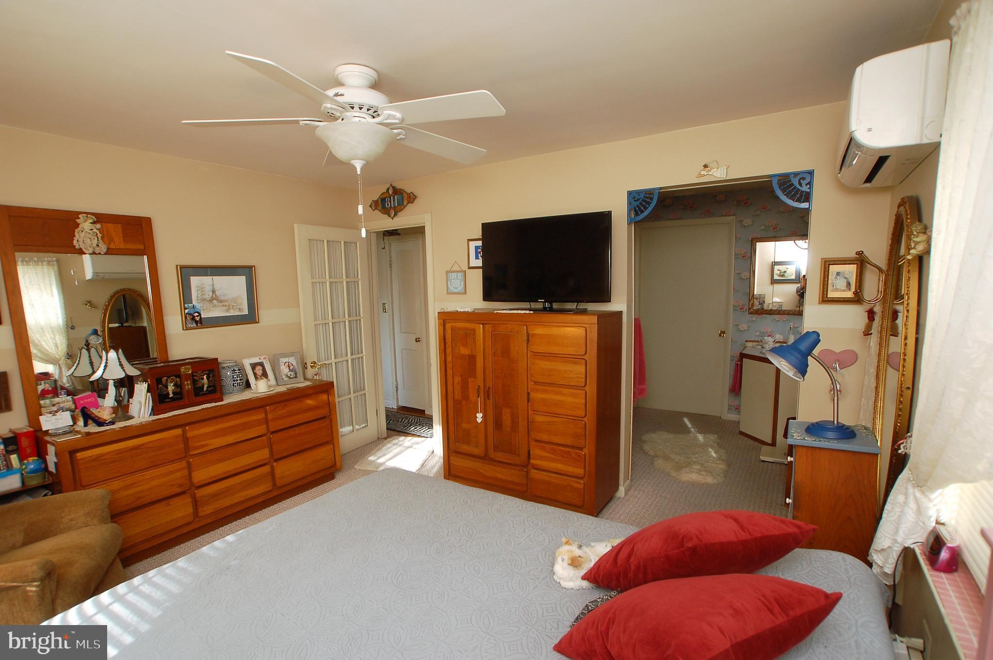 1005 Kingston Road Baltimore, MD 21208 - Photo 16 of 45 a living room with furniture and a flat screen tv