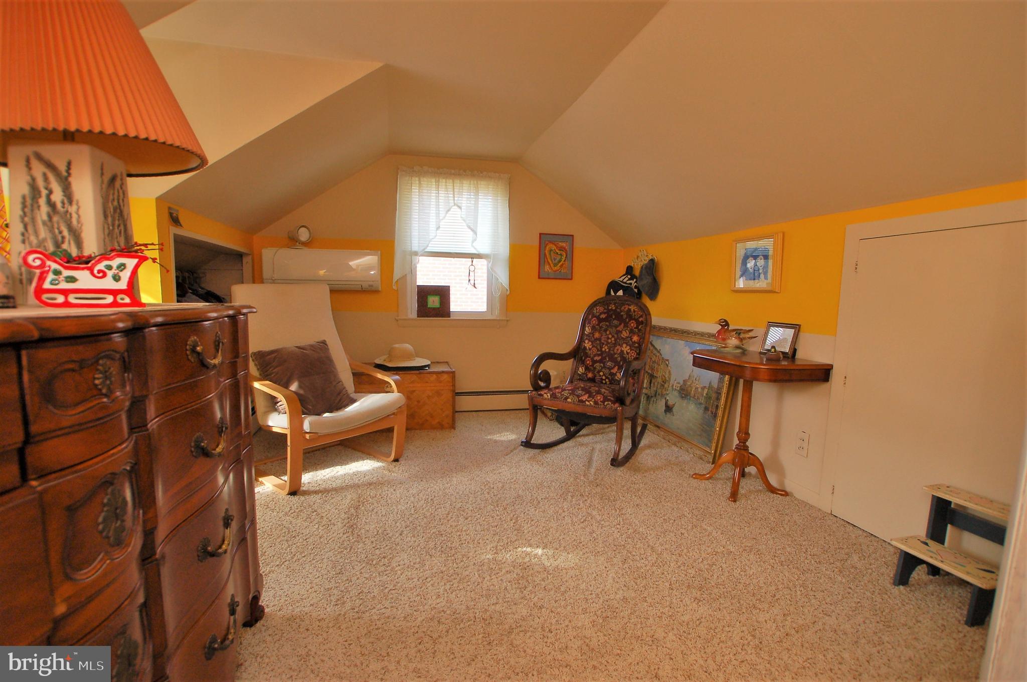 1005 Kingston Road Baltimore, MD 21208 - Photo 23 of 45 a living room with furniture and a flat screen tv