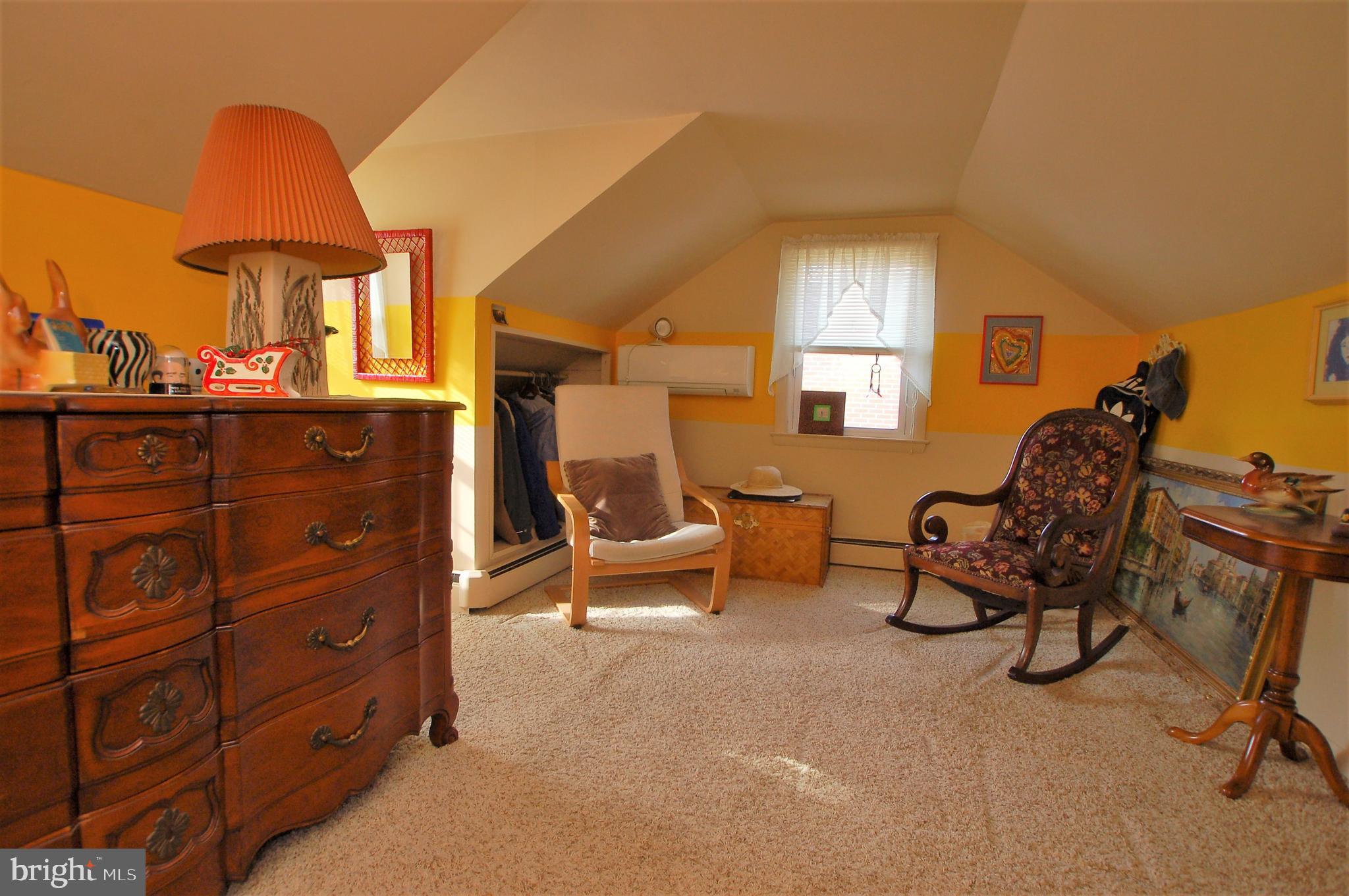 1005 Kingston Road Baltimore, MD 21208 - Photo 24 of 45 a bedroom with furniture and a window