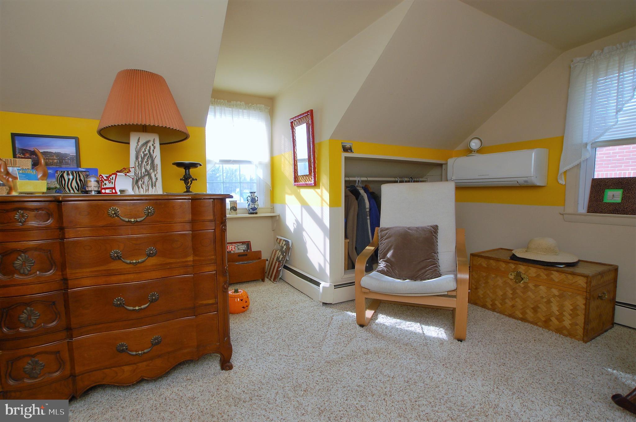 1005 Kingston Road Baltimore, MD 21208 - Photo 26 of 45 a bedroom with a bed and a dresser