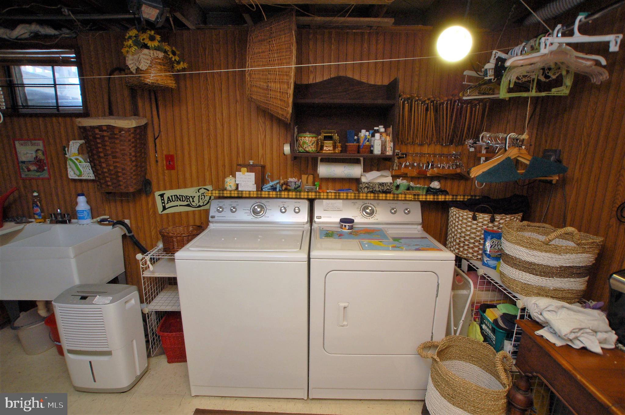 1005 Kingston Road Baltimore, MD 21208 - Photo 35 of 45 a utility room with dryer and washer