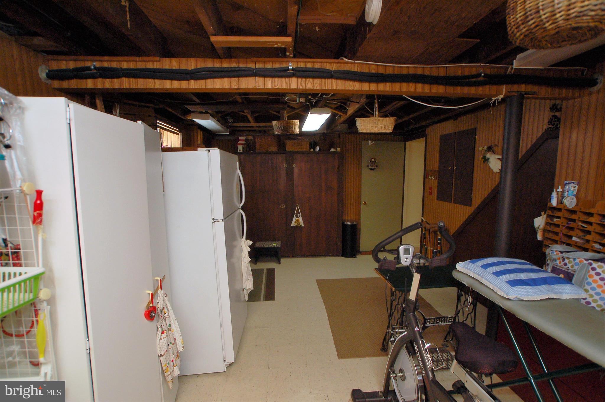1005 Kingston Road Baltimore, MD 21208 - Photo 36 of 45 a utility room with dryer and washer
