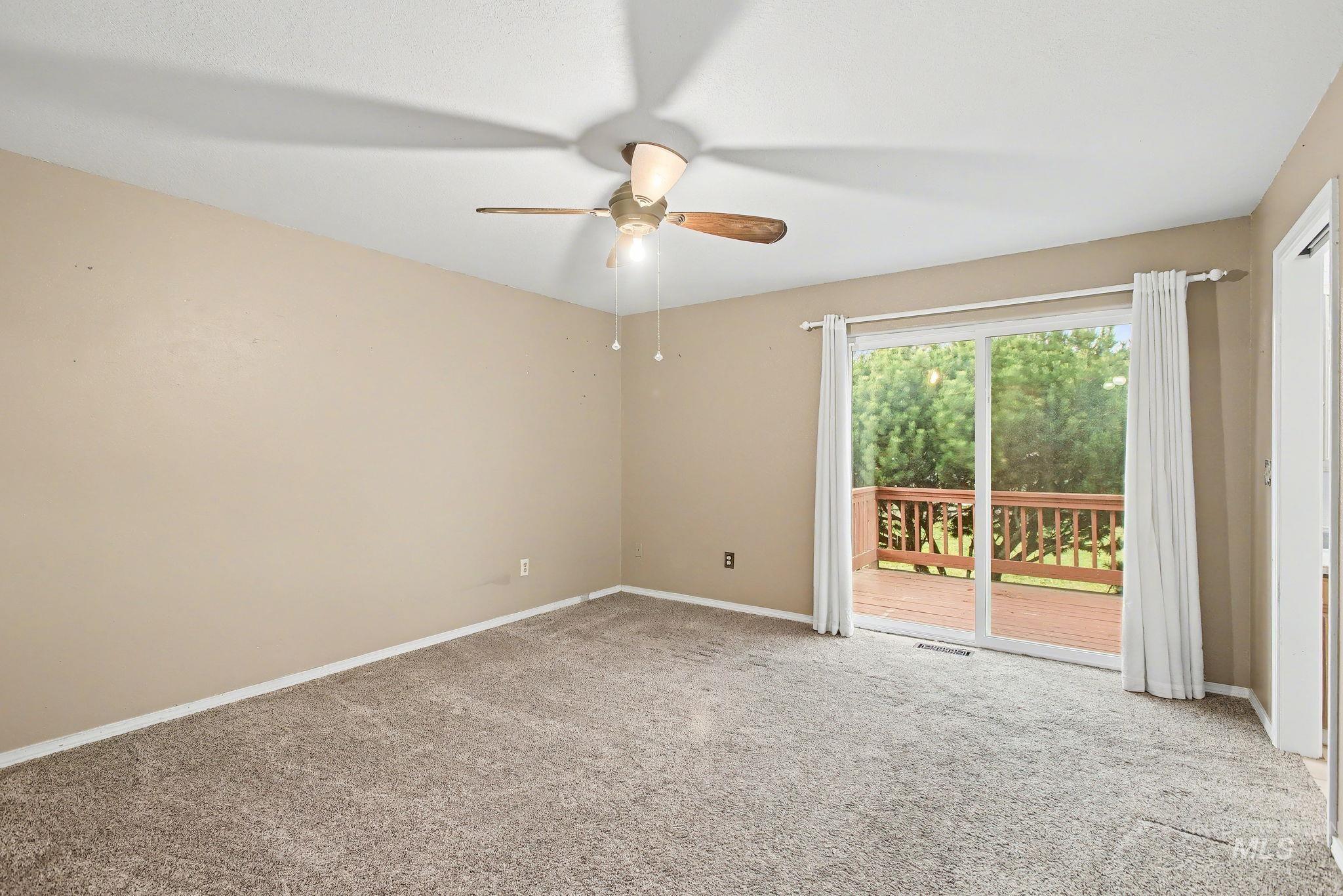 2242 Chukar Lane Clarkston, WA 99403 - Photo 18 of 41 Unfurnished room with light carpet and ceiling fan