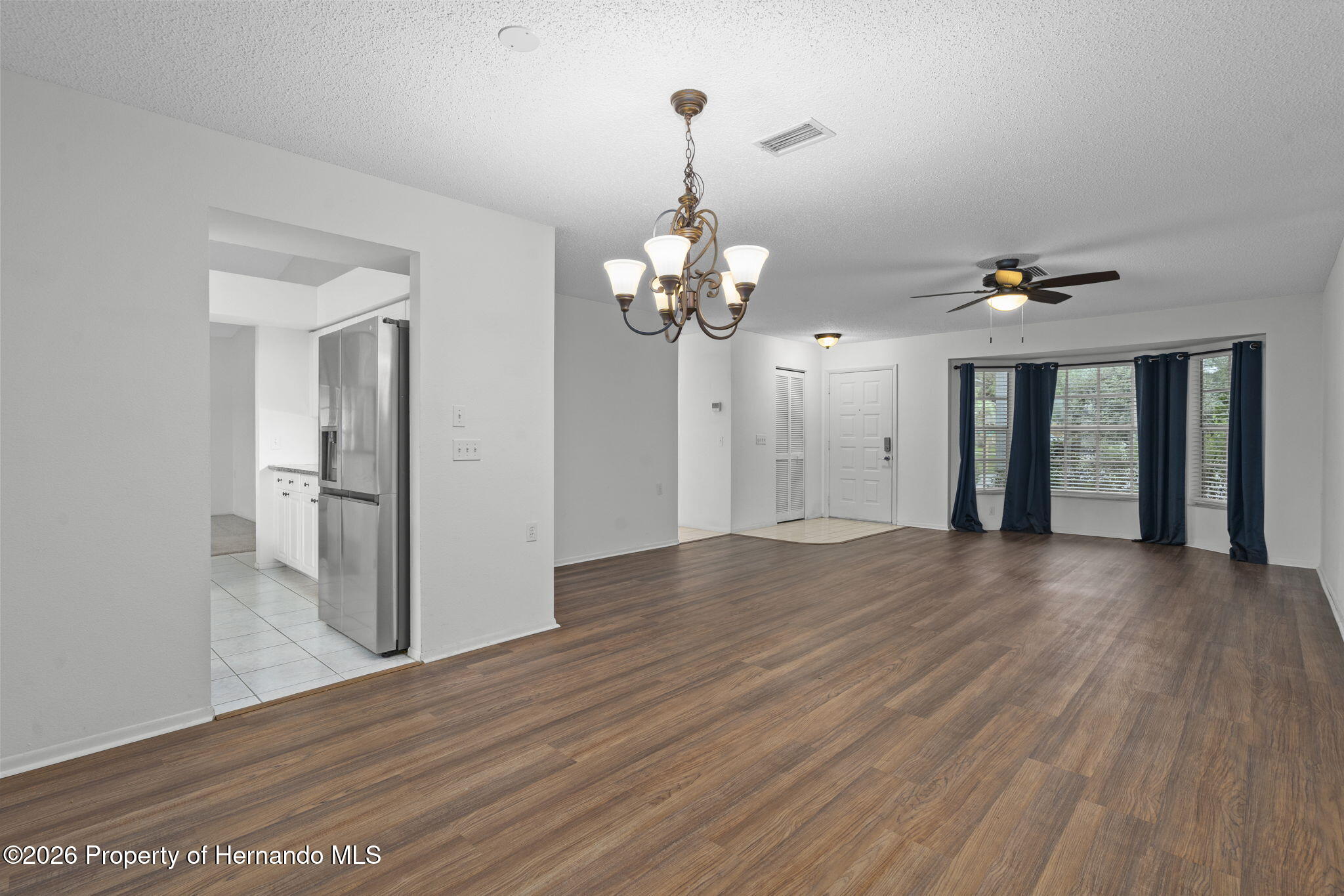 3072 Eagle Bend Road Spring Hill, FL 34606 - Photo 16 of 115 Living Room/Dining Room