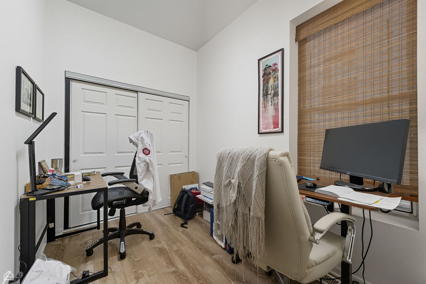 2245 West Erie Street Chicago, IL 60612 - Photo 21 of 25 a view of a workspace with furniture and a window