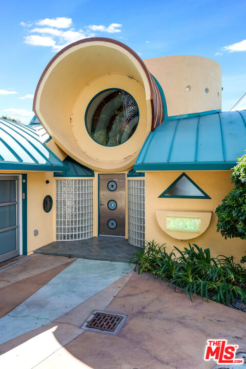 3930 Rambla Orienta Malibu, CA 90265 - Photo 4 of 30 a front view of a house with garden