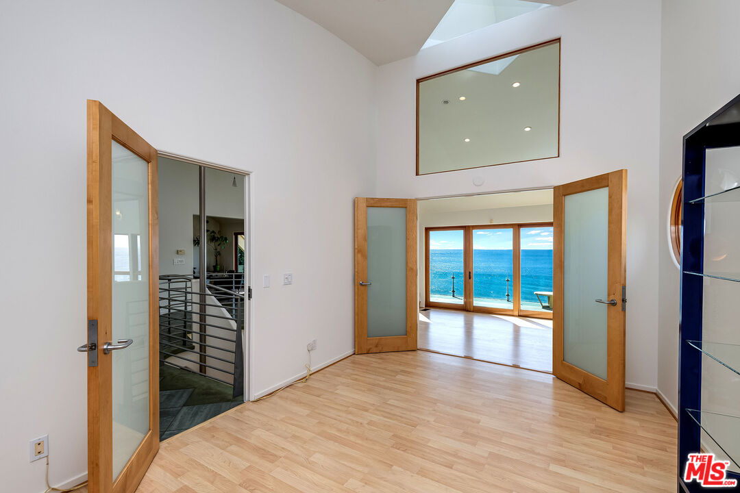 3930 Rambla Orienta Malibu, CA 90265 - Photo 10 of 30 wooden floor in an empty room