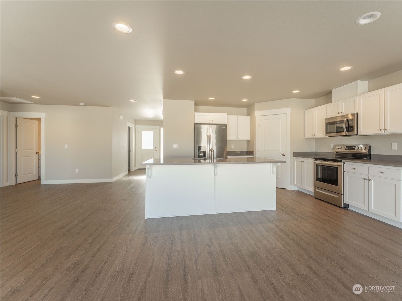 39 South Millbrook Loop East Wenatchee, WA 98802 - Photo 14 of 32 a view of kitchen with kitchen island wooden floor and center island
