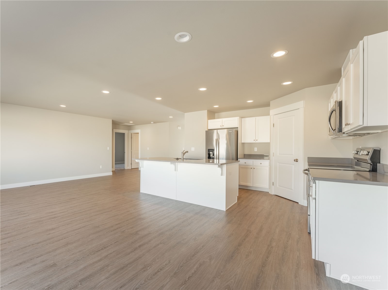 39 South Millbrook Loop East Wenatchee, WA 98802 - Photo 15 of 32 a view of kitchen with kitchen island wooden floor center island and stainless steel appliances