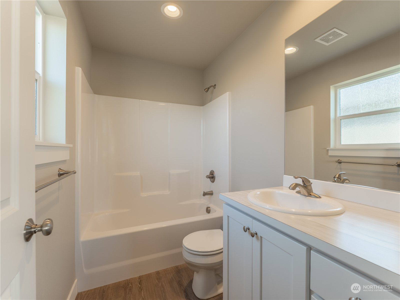 39 South Millbrook Loop East Wenatchee, WA 98802 - Photo 23 of 32 a bathroom with a sink a toilet and shower