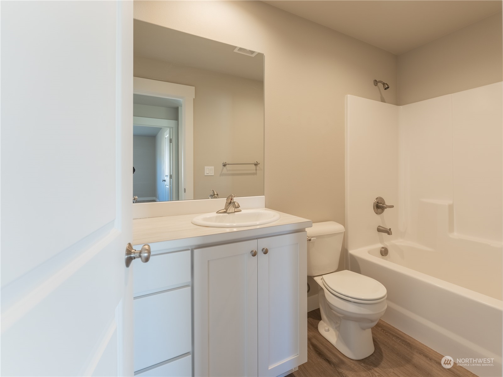 39 South Millbrook Loop East Wenatchee, WA 98802 - Photo 27 of 32 a bathroom with a sink a toilet and shower