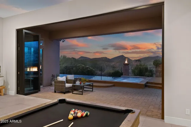 a kitchen with stainless steel appliances granite countertop a refrigerator and a stove