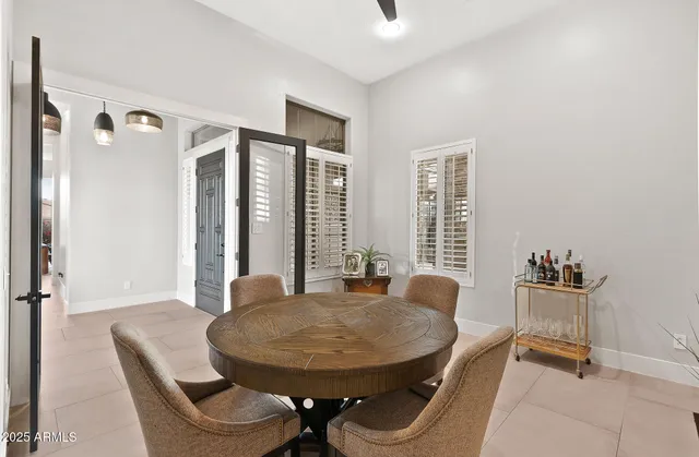 a kitchen with stainless steel appliances kitchen island granite countertop a stove top oven a sink and dishwasher