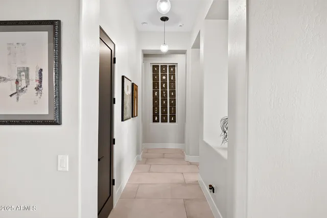 a view of a sink and a wooden bench
