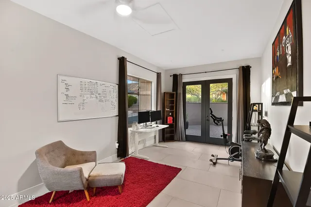 a view of a house with pool and sitting area