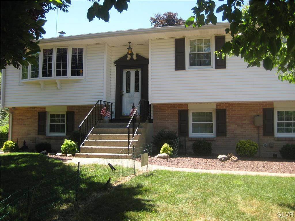 4151 Shimerville Road Emmaus, PA 18049 - Photo 1 of 38 Classic bi-level w/side-entry 2-car garage.