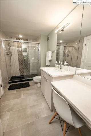 a room with a washing machine and sink