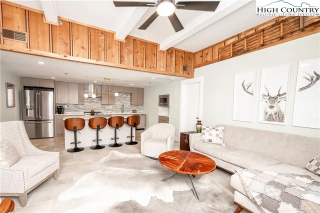 a living room with furniture and couch