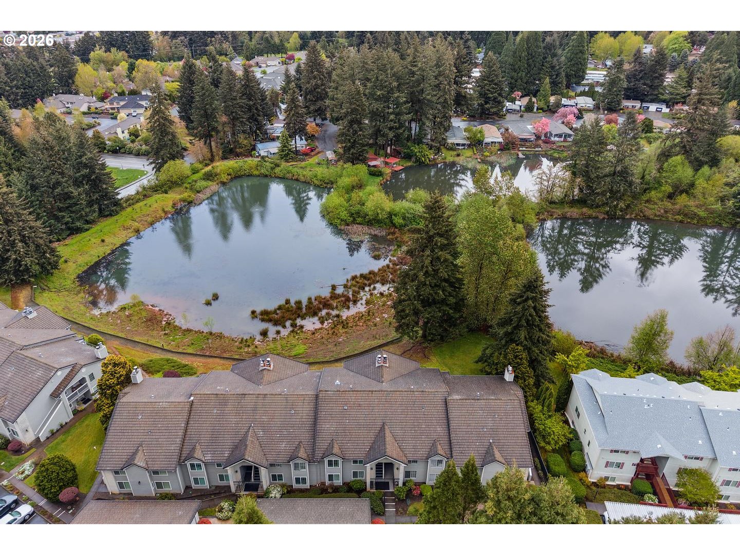 1840 Rees Hill Road Southeast, Unit 19 Salem, OR 97306 - Photo 30 of 34 a view of a swimming pool with sitting area