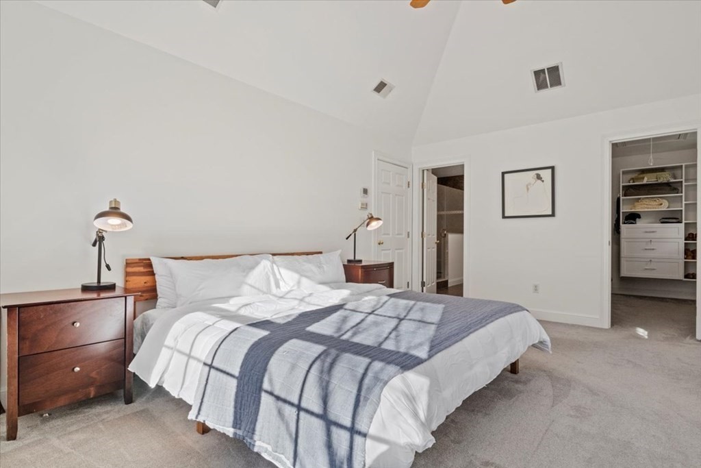 15 Fatherland Drive Newbury, MA 01922 - Photo 19 of 42 a bedroom with a bed and a night stand