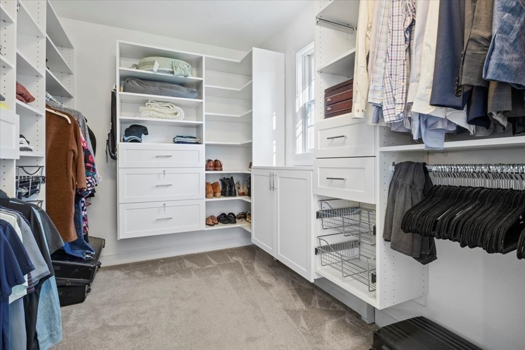 15 Fatherland Drive Newbury, MA 01922 - Photo 21 of 42 a view of walk in closet with clothes and shoes