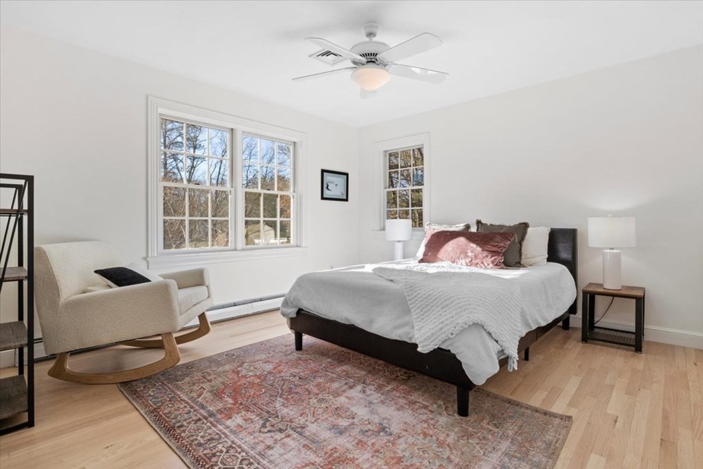 15 Fatherland Drive Newbury, MA 01922 - Photo 22 of 42 a bedroom with a bed chair and window