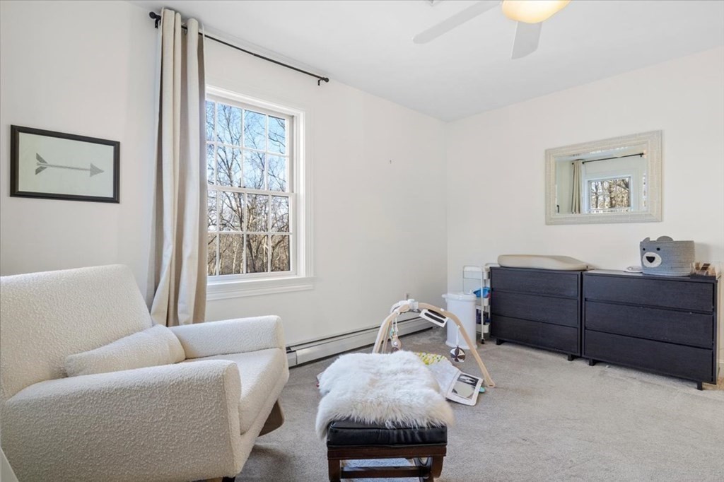 15 Fatherland Drive Newbury, MA 01922 - Photo 24 of 42 a bedroom with furniture and a window