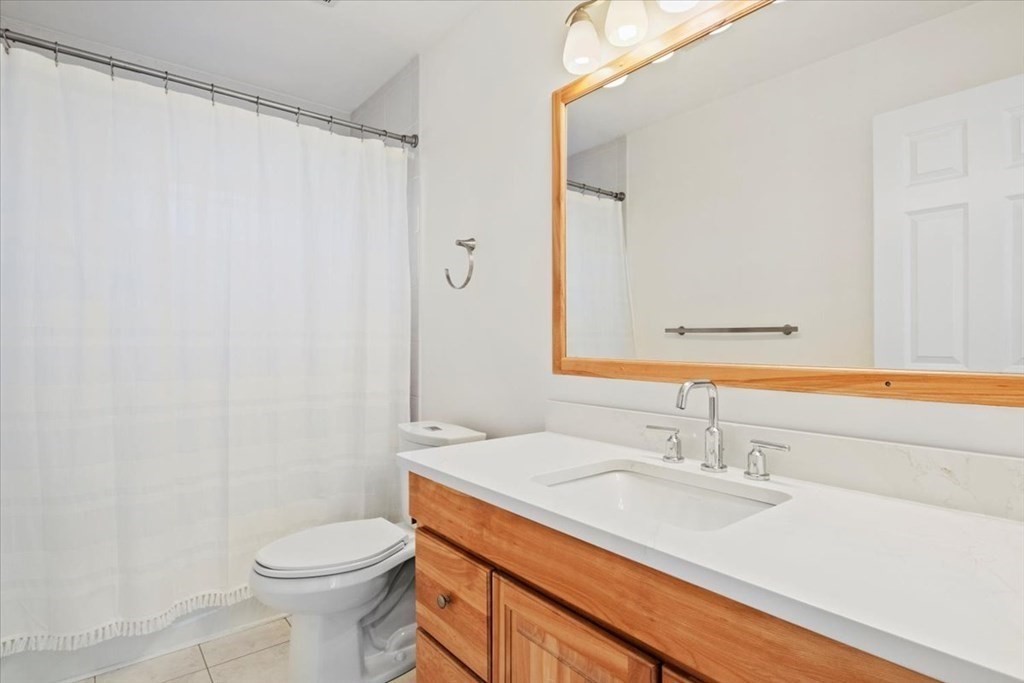15 Fatherland Drive Newbury, MA 01922 - Photo 25 of 42 a bathroom with a sink and a mirror