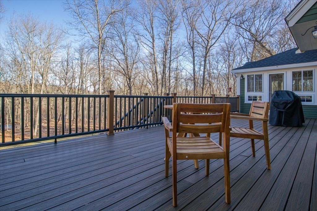 15 Fatherland Drive Newbury, MA 01922 - Photo 30 of 42 a view of a chairs and table on the wooden floor