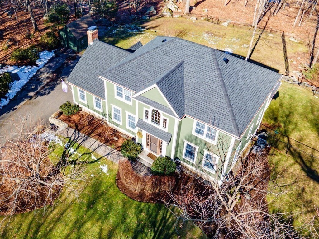 15 Fatherland Drive Newbury, MA 01922 - Photo 35 of 42 a backyard of a house with lots of green space