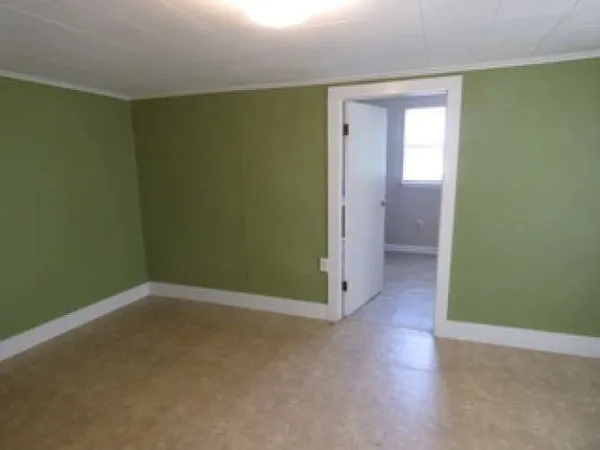 an empty room and closet area