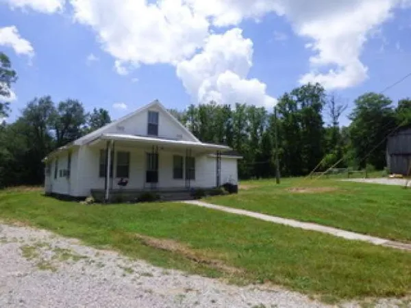 a view of a house with a big yard