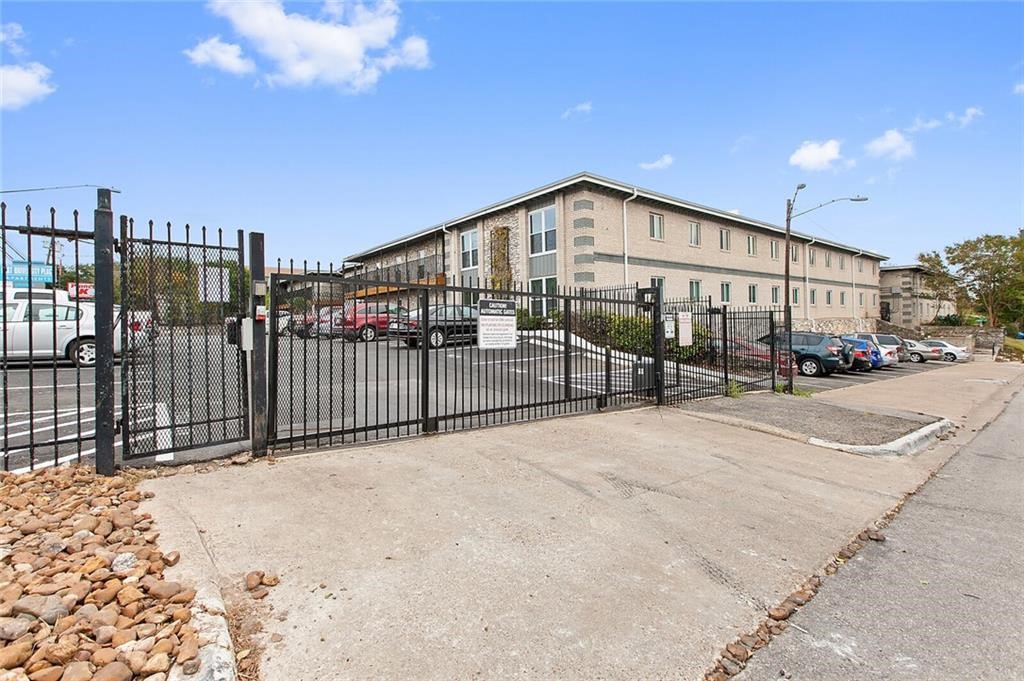 2401 Manor Road, Unit 224 Austin, TX 78722 - Photo 10 of 10 a view of a building with a road
