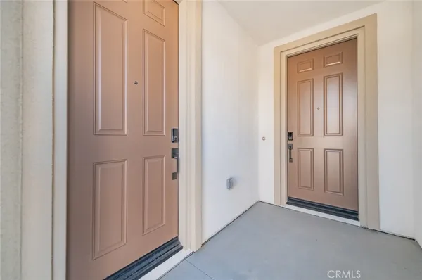 an empty room with closet area