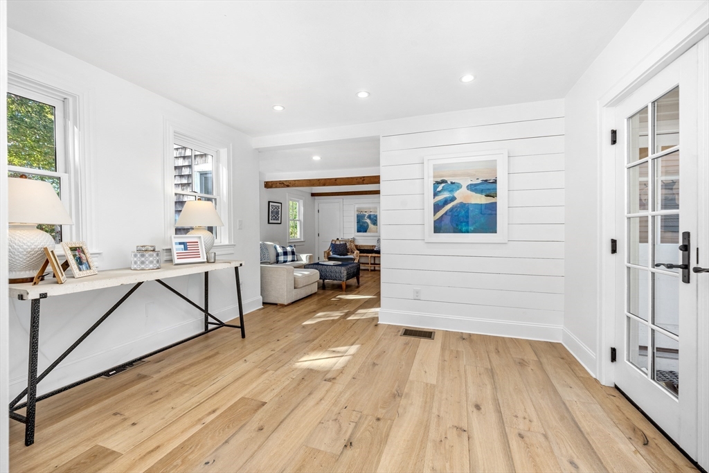 1088 Main Street Hingham, MA 02043 - Photo 15 of 37 a living room with furniture and a wooden floor
