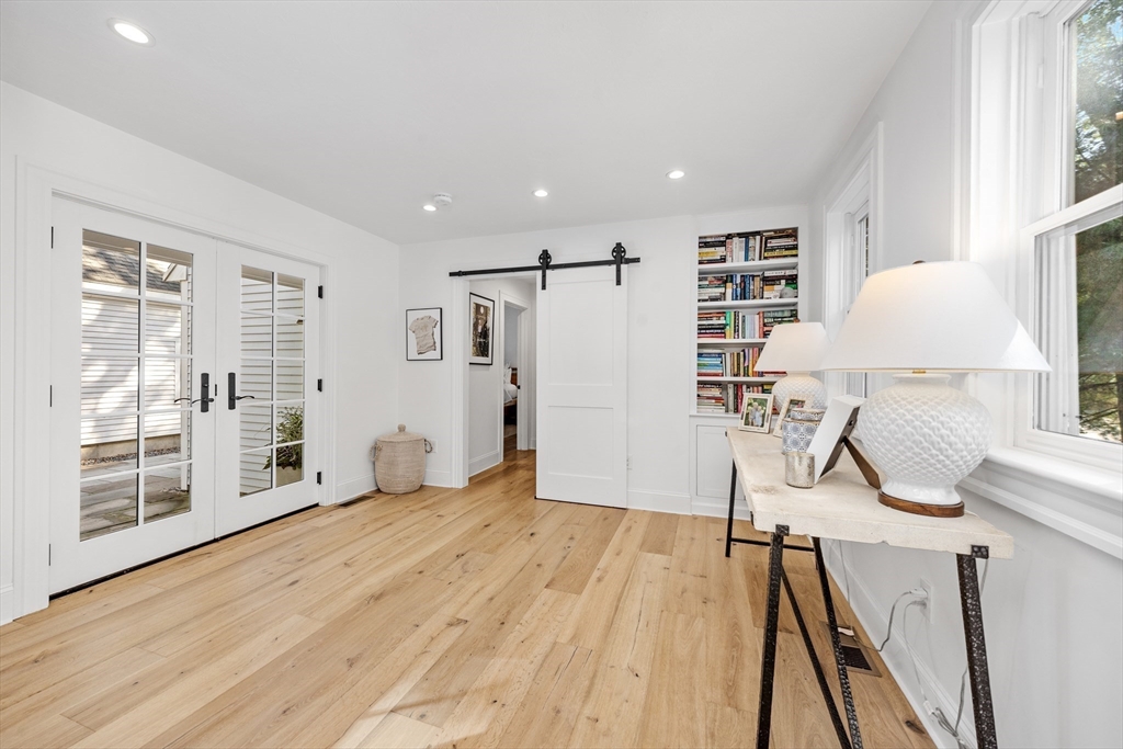 1088 Main Street Hingham, MA 02043 - Photo 17 of 37 a view of empty room with wooden floor and window