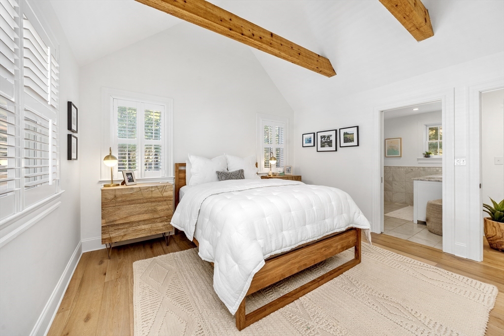 1088 Main Street Hingham, MA 02043 - Photo 19 of 37 a bedroom with a bed and a couch