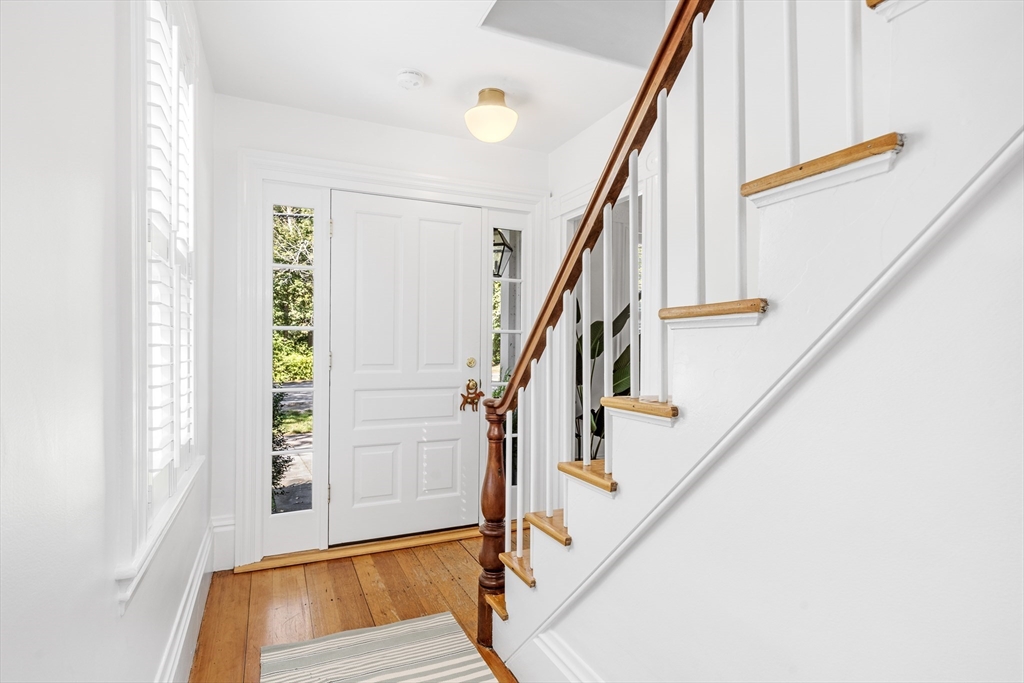 1088 Main Street Hingham, MA 02043 - Photo 21 of 37 a view of entryway with wooden floor and stairs