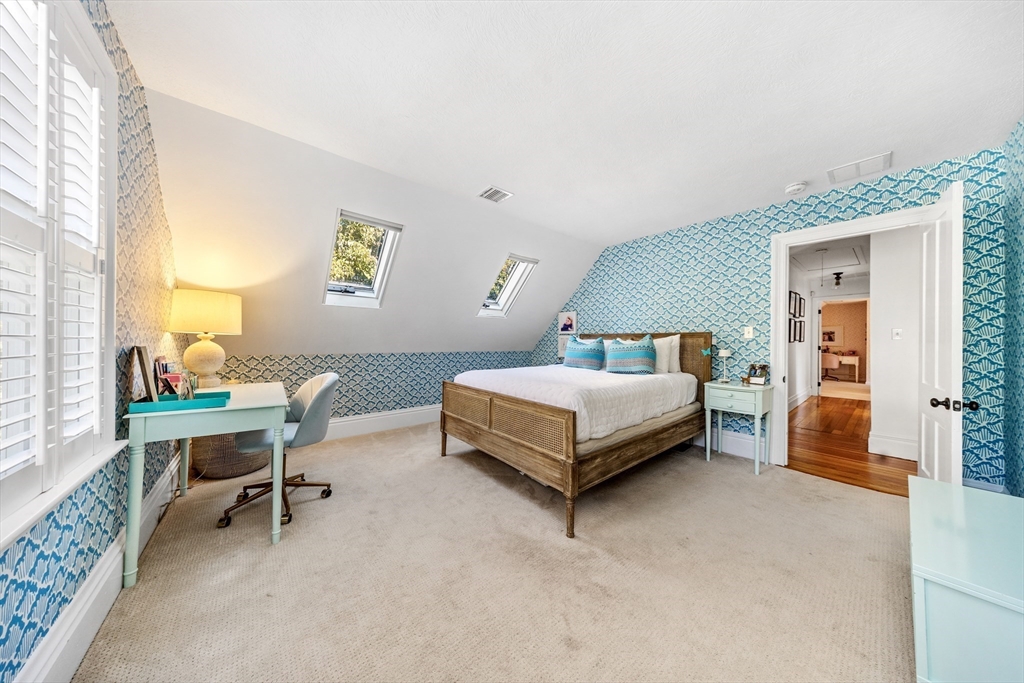 1088 Main Street Hingham, MA 02043 - Photo 27 of 37 a bedroom with a bed and a desk