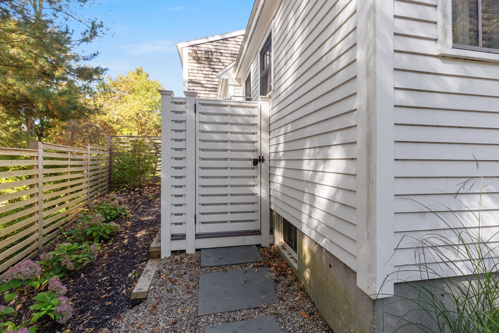 1088 Main Street Hingham, MA 02043 - Photo 36 of 37 a view of a pathway with a house