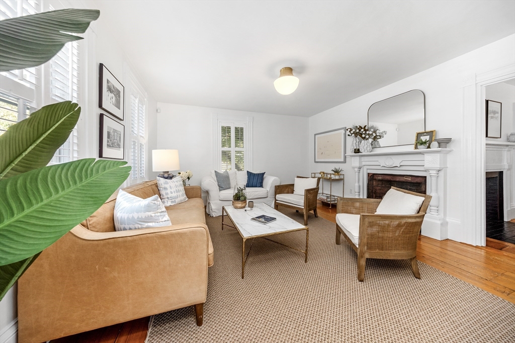 1088 Main Street Hingham, MA 02043 - Photo 4 of 37 a living room with furniture and a fireplace