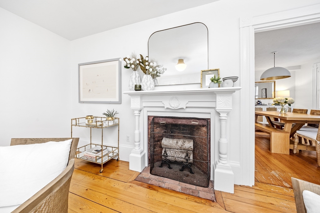 1088 Main Street Hingham, MA 02043 - Photo 5 of 37 a living room with furniture and a fireplace