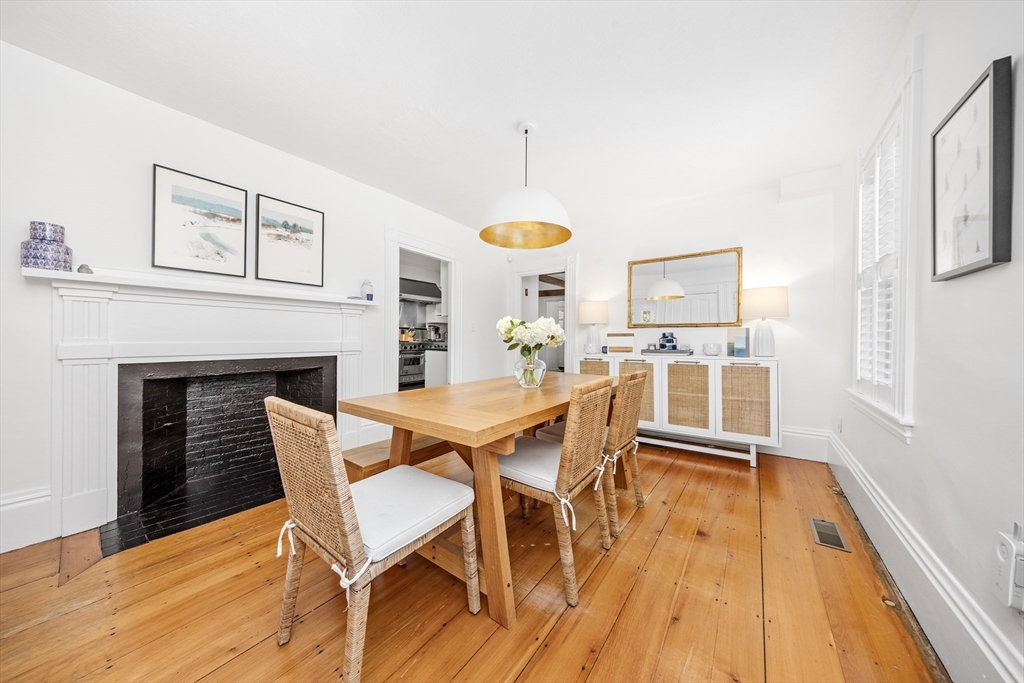 1088 Main Street Hingham, MA 02043 - Photo 7 of 37 a view of a livingroom with furniture and a fireplace