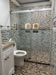 8232 Niles Center Road, Unit 404 Skokie, IL 60077 - Photo 5 of 5 a bathroom with a toilet and a shower
