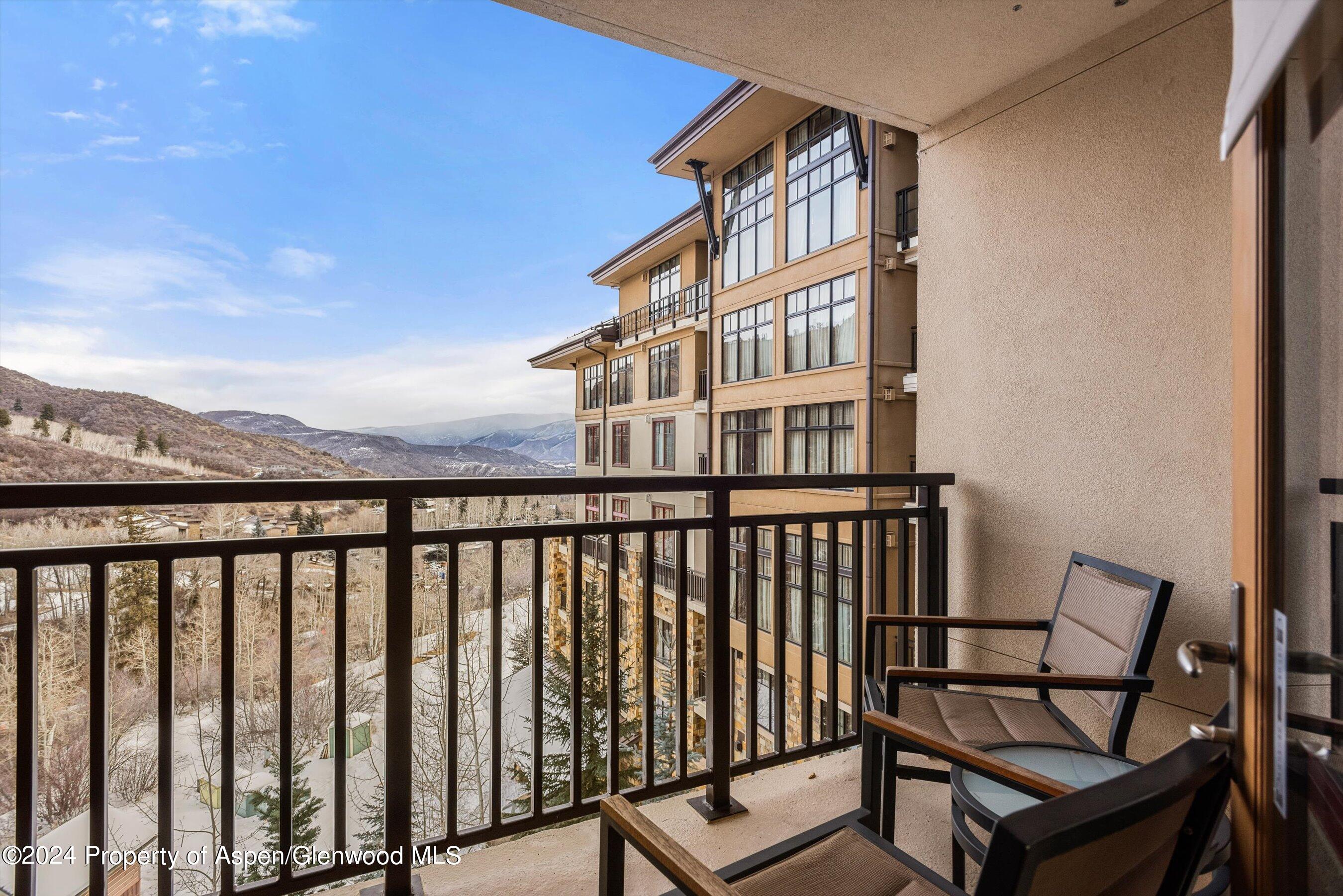 130 Wood Road, Unit 514 Snowmass Village, CO 81615 - Photo 11 of 11 a view of a balcony with wooden floor