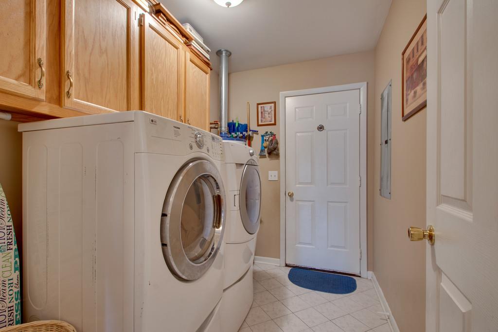 1099 Jump Off Road Bon Aqua, TN 37025 - Photo 11 of 16 a utility room with dryer and washer