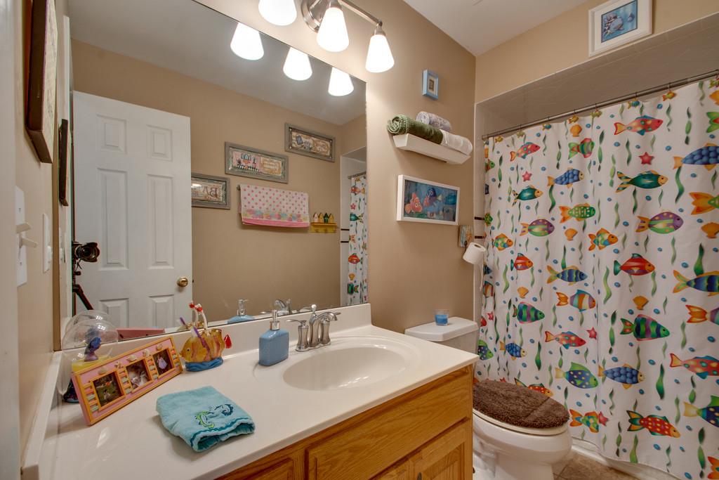 1099 Jump Off Road Bon Aqua, TN 37025 - Photo 10 of 16 a bathroom with a sink toilet and shower